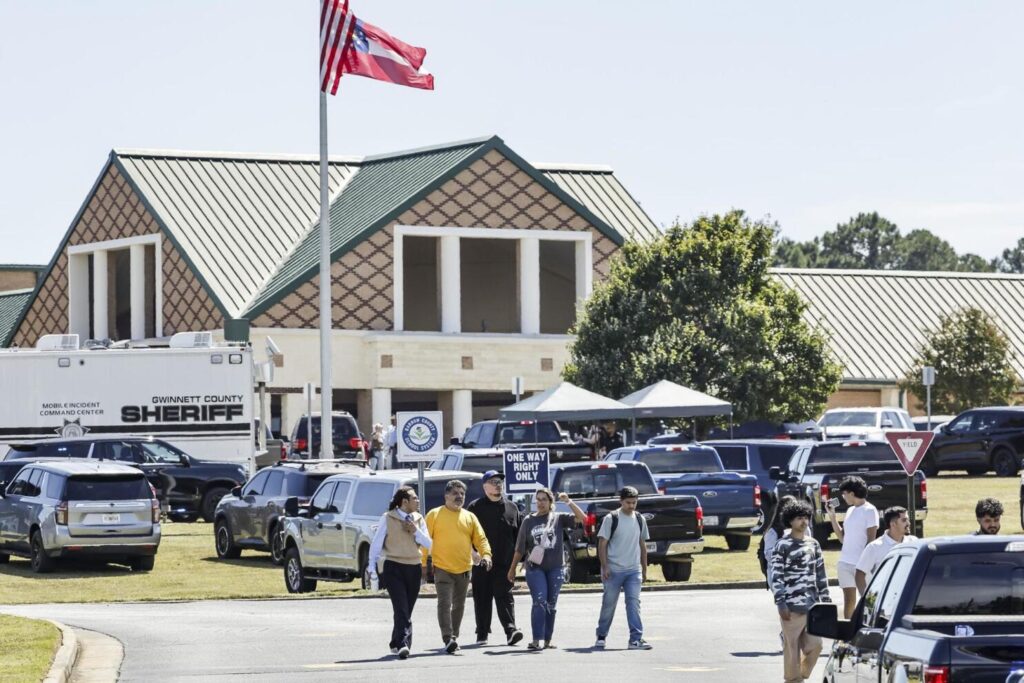 Winder (United States), 04/09/2024.- People leave the scene of a shooting at Apalachee High School in Winder, Georgia, USA, 04 September 2024. At least four people died and nine injured after a shooting at the school, the Georgia Bureau of Investigation (GBI) announced on social media platform X, formerly Twitter, adding that one suspect was in custody. EFE/EPA/ERIK S. LESSER